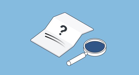 Paper with question mark and magnifying glass